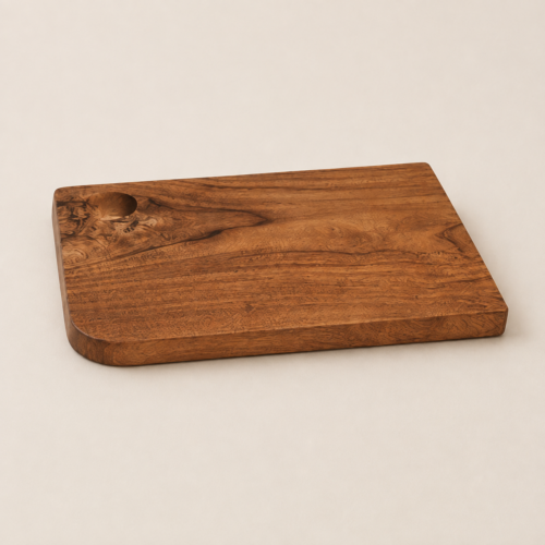 MOC-KT-PCB-M MOCCALO medium wooden cutting board with a handle on a cream background