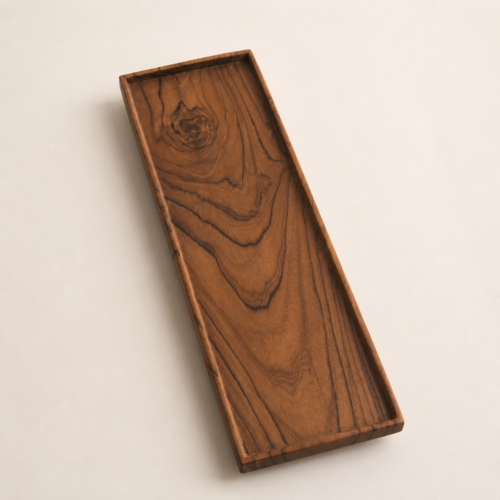 MOCCALO long rectangular wooden tea tray with a raised rim on a cream background