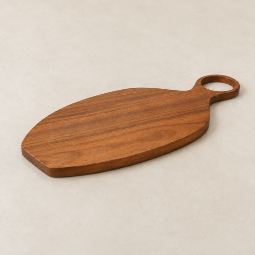 MOCCALO wooden serving board with a handle on a cream background